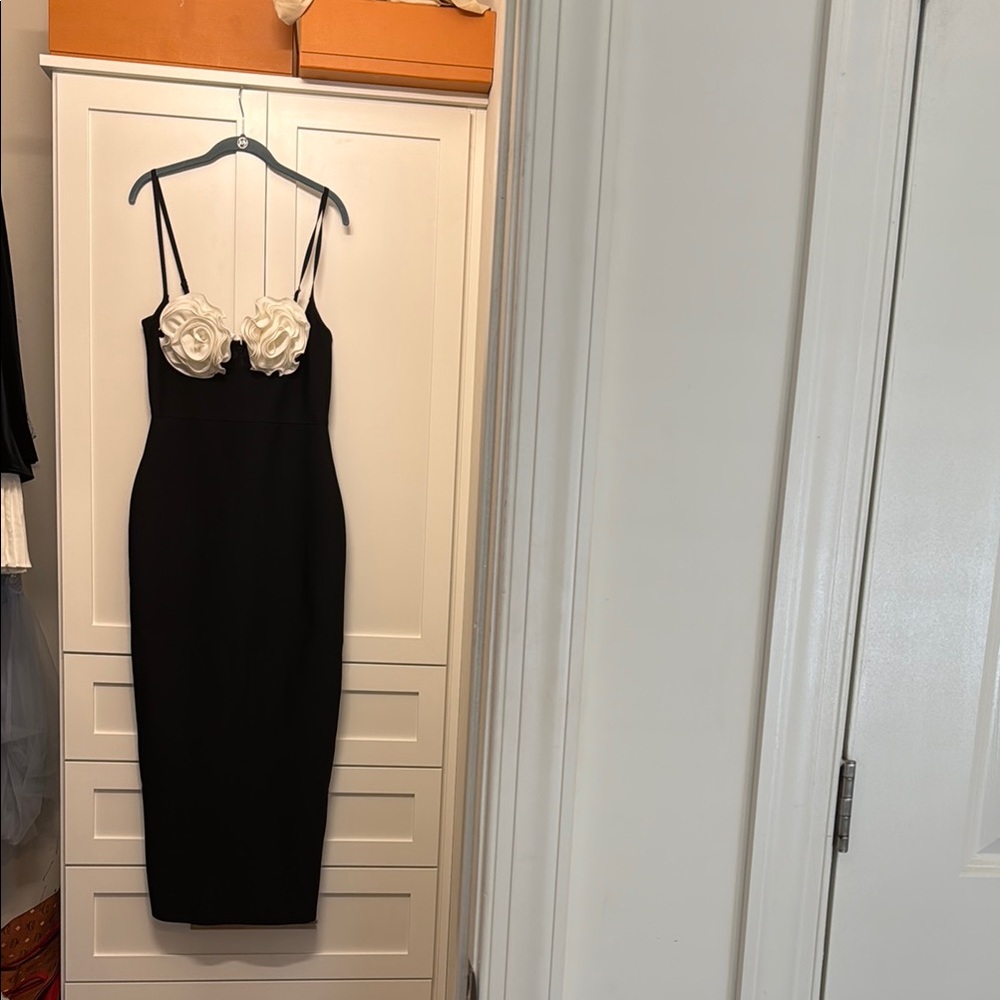Elegant Black Dress with White Floral Accents